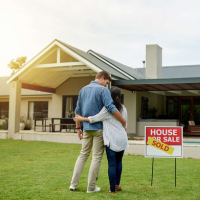 Couple in front of Midland house